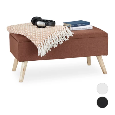 Sötétbarna színű fa lábbakkal szerelt ottomán ülőke szövet borítással és belső tárolórésszel