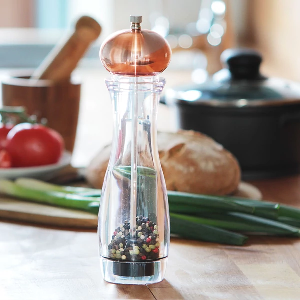 Pefno réz és akril alapanyagokból készült kézi fűszerörlő és fűszermalom só és bors örléséhez