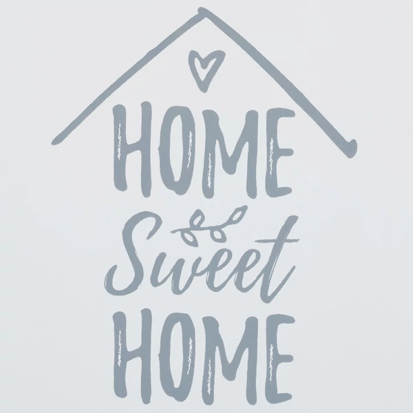 Home sweet home felirat a nolka fából készült kulcstartó szekrény ajtaján