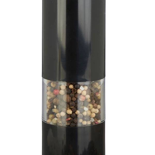 Fekete színű kézi fűszerörlő és fűszermalom feltöltött borssal teli tartálya