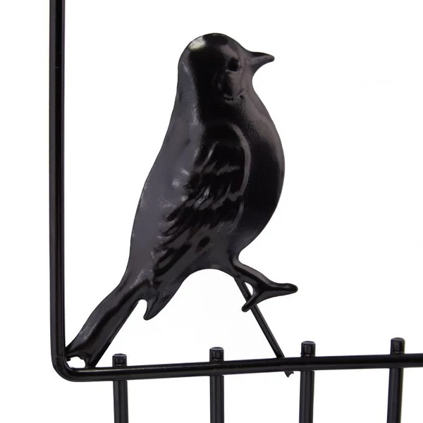 Bird fali ékszertartó állvány középső részén elhelyezett fekete színű madárka dísz közelről