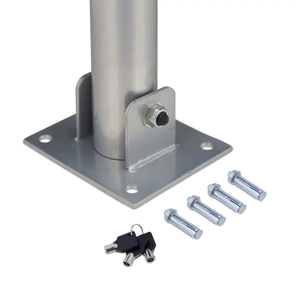 Kerek parkolásgátló oszlop talpa közelről és a telepítéshez szükséges kötőelemek